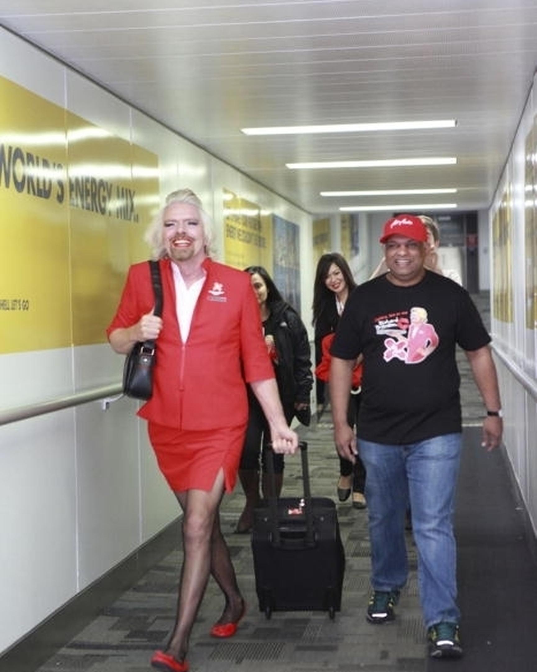 Richard Branson Serves As Airasia Stewardess After Losing Bet